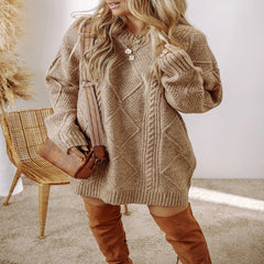 Woman wearing a beige knitted dress with brown over-the-knee boots in a cozy indoor setting. - Fashlot