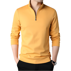 Yellow long-sleeve shirt with a zipper on a white background