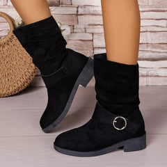 Black knee-high boots with a buckle on a wooden floor. - Fashlot