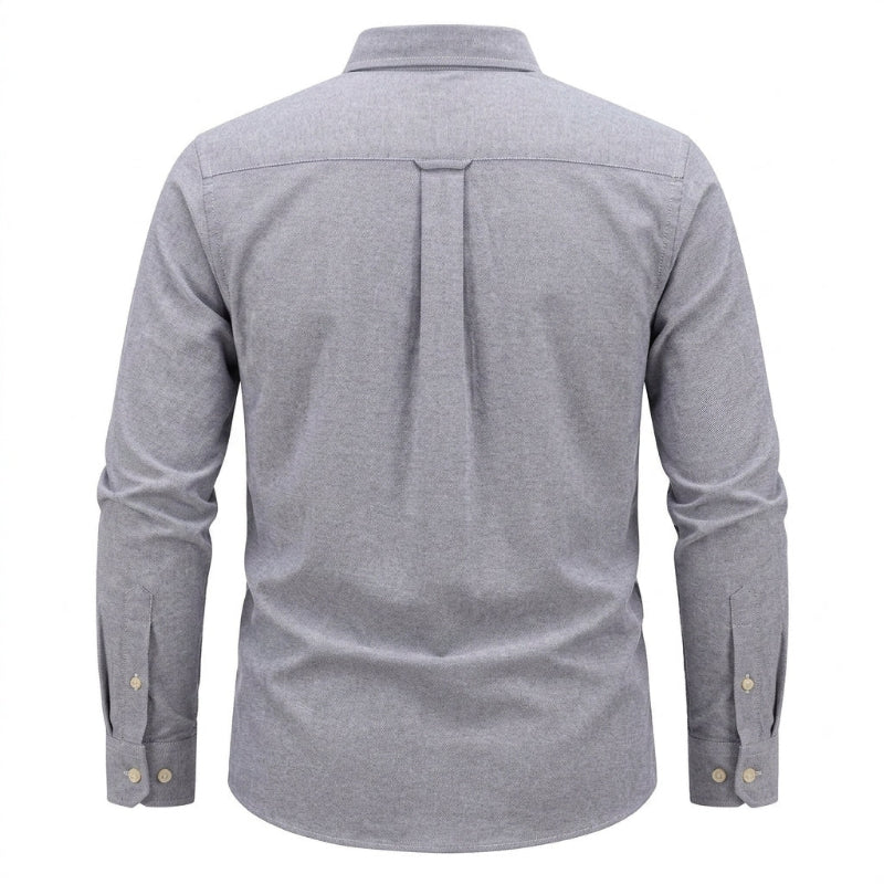 A men's long-sleeve button-down shirt shown from the back, featuring a heather gray fabric, a vertical pleat down the center back, and gold-tone button details on the cuffs. - Fashlot 