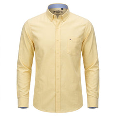 A pale yellow long-sleeve button-down shirt with a chest pocket, shown on a clean white background. - Fashlot 
