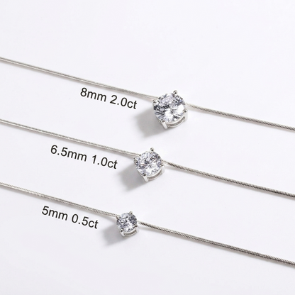Three silver-toned chain necklaces with single clear gemstones are shown on a white background, each labeled with size and carat information: 8mm 2.0ct, 6. - Fashlot
