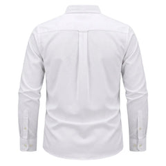 White long-sleeve button-up shirt shown from the back, featuring a vertical center pleat and buttoned cuffs, displayed on a neutral light gray background. - Fashlot 
