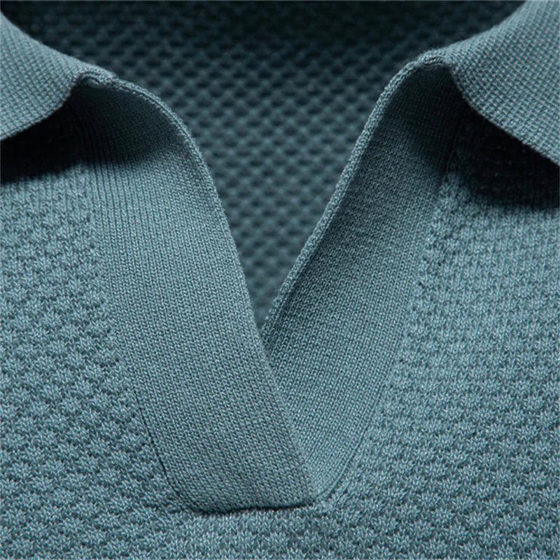 Close-up of a textured teal fabric with a collar - Fashlot