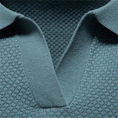 Close-up of a textured teal fabric with a collar - Fashlot