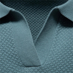 Close-up of a textured teal fabric with a collar - Fashlot