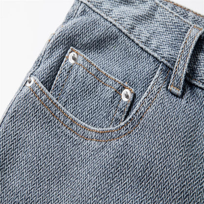 Close-up of a blue denim pocket with stitching details on a white background - Fashlot