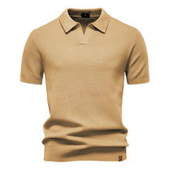 Caeml polo shirt on a white background