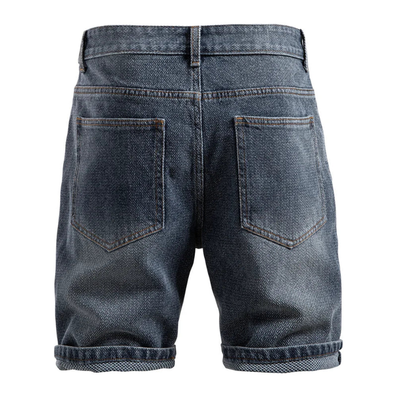 Back view of blue denim shorts on a white background