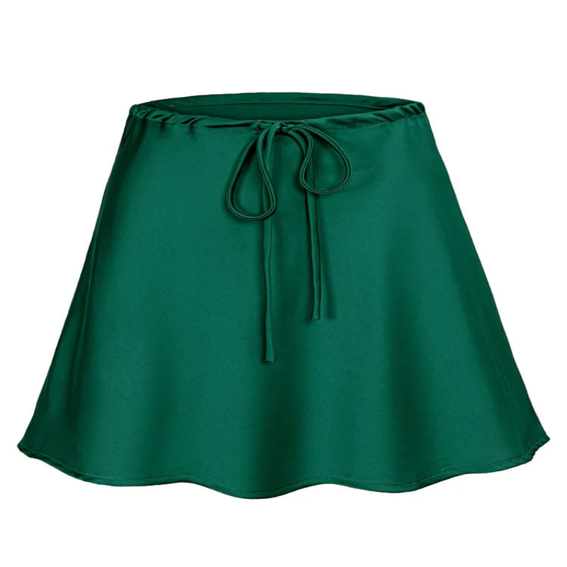 Green satin skirt with a tie waist on a white background