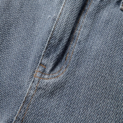 Close-up of denim fabric with a pocket detail - Fashlot
