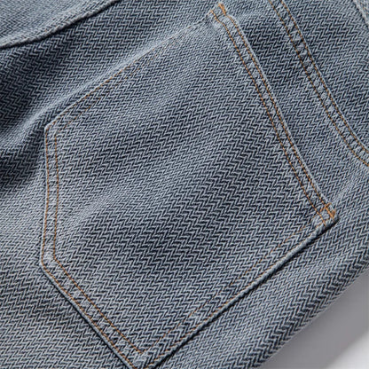 Close-up of a blue denim pocket with stitching detail - Fashlot