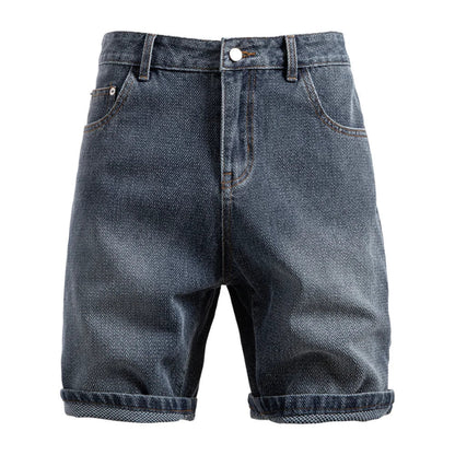 Blue denim shorts on a white background