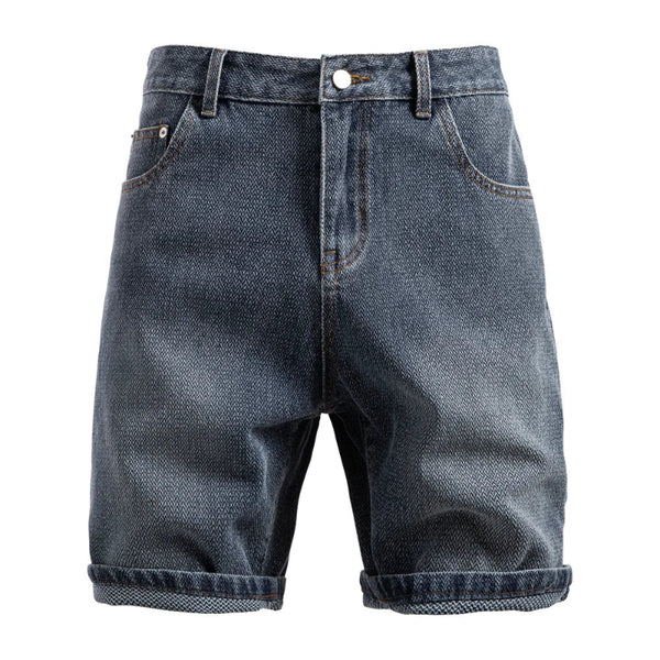 Blue denim shorts on a white background