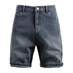 Blue denim shorts on a white background