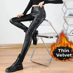 black textured pants sitting on a chair with graphic and text. - Fashlot